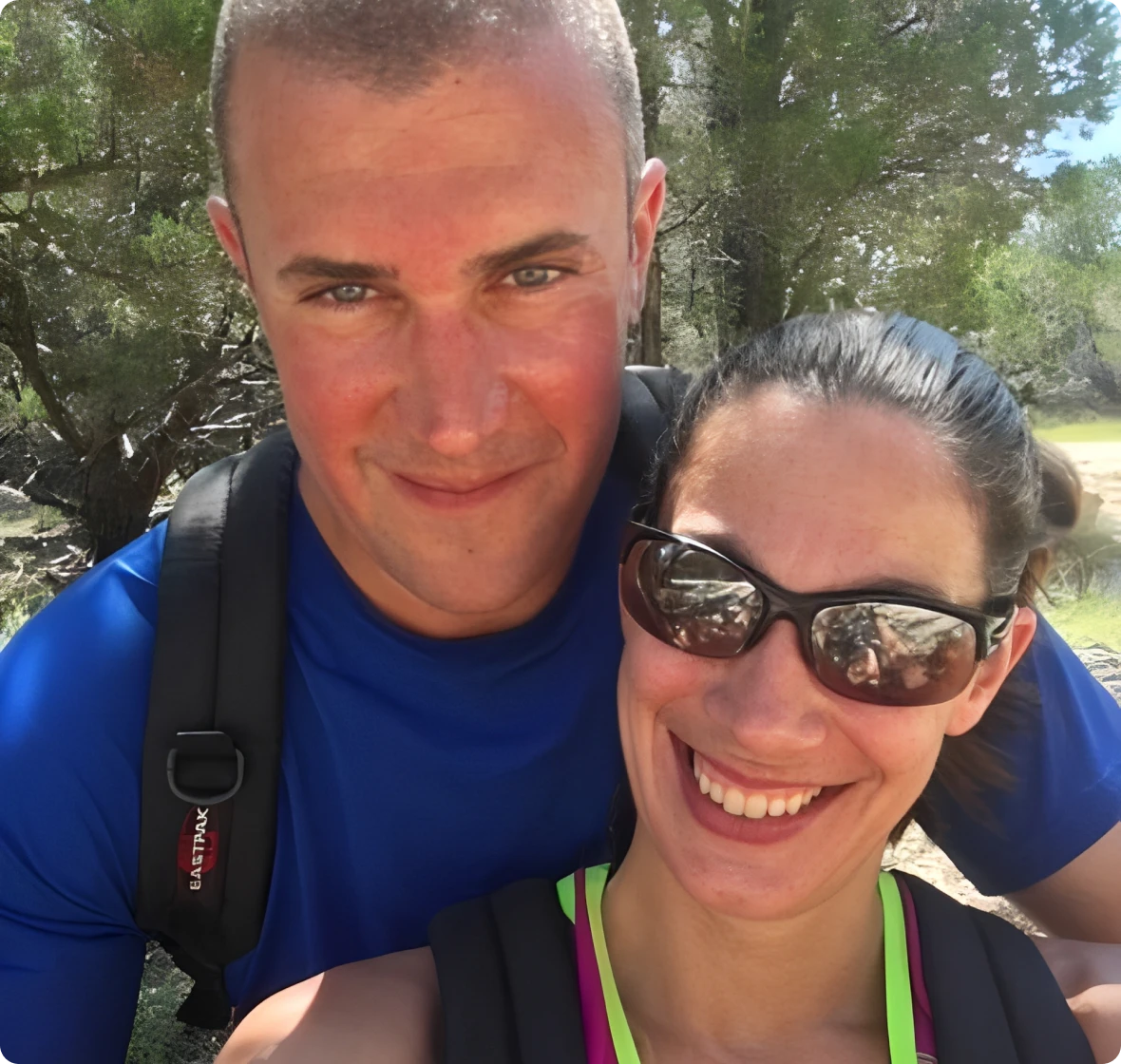 Happy pair enjoying nature hike